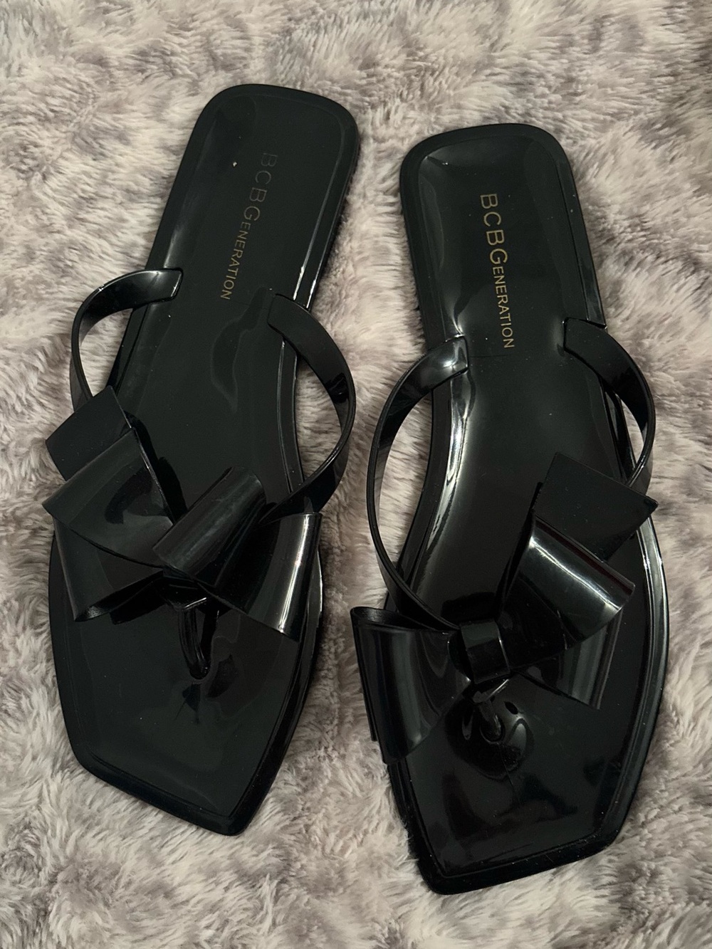 BCBGeneration Black Bow Jelly Slide Sandals